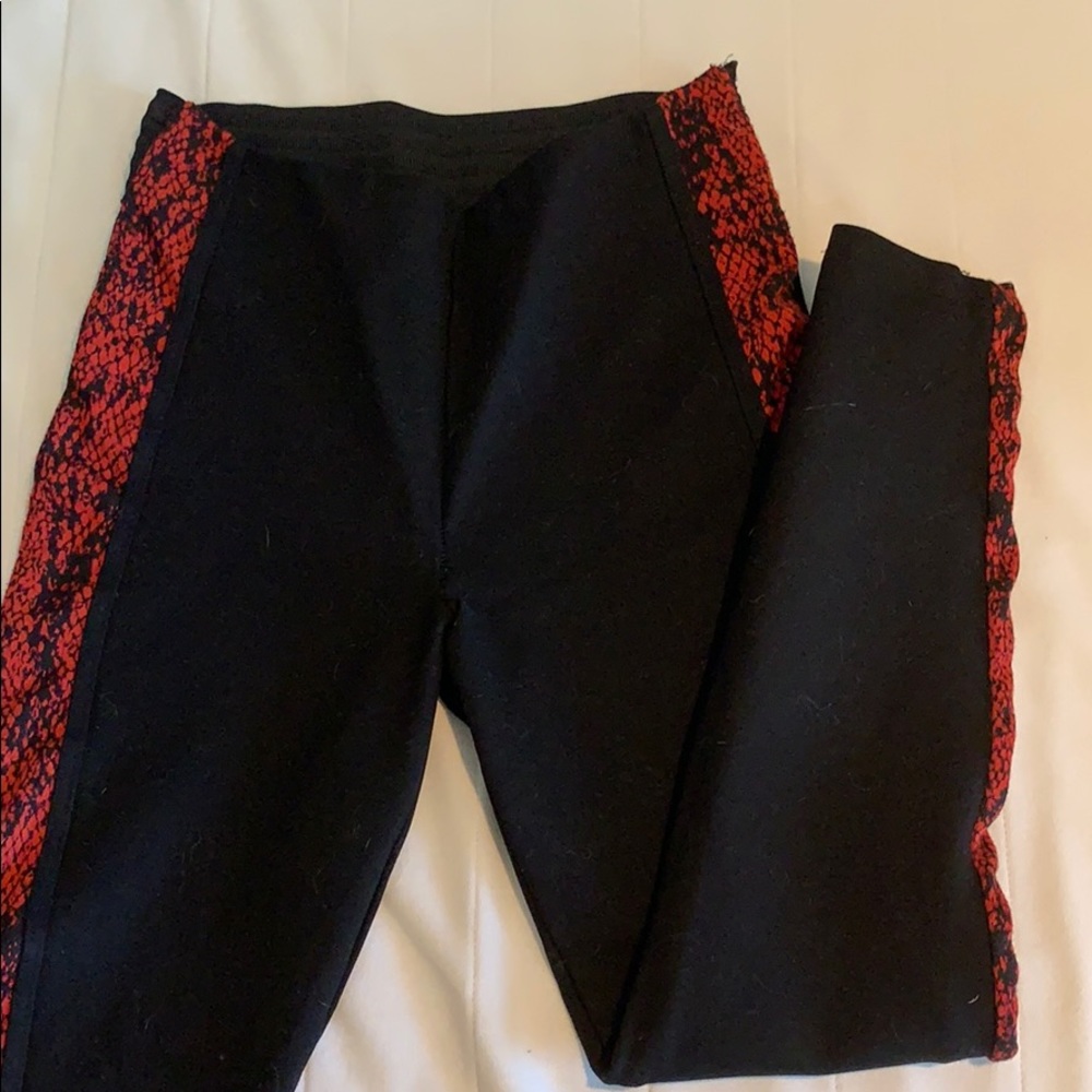 Black and red leggings/pants.